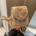 mini handbag with floral jacquard pattern and playful drawstring Nord bags