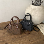 mini handbag made of high-quality material with a textured surface