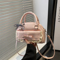 mini handbag with playful bow accent and floral details