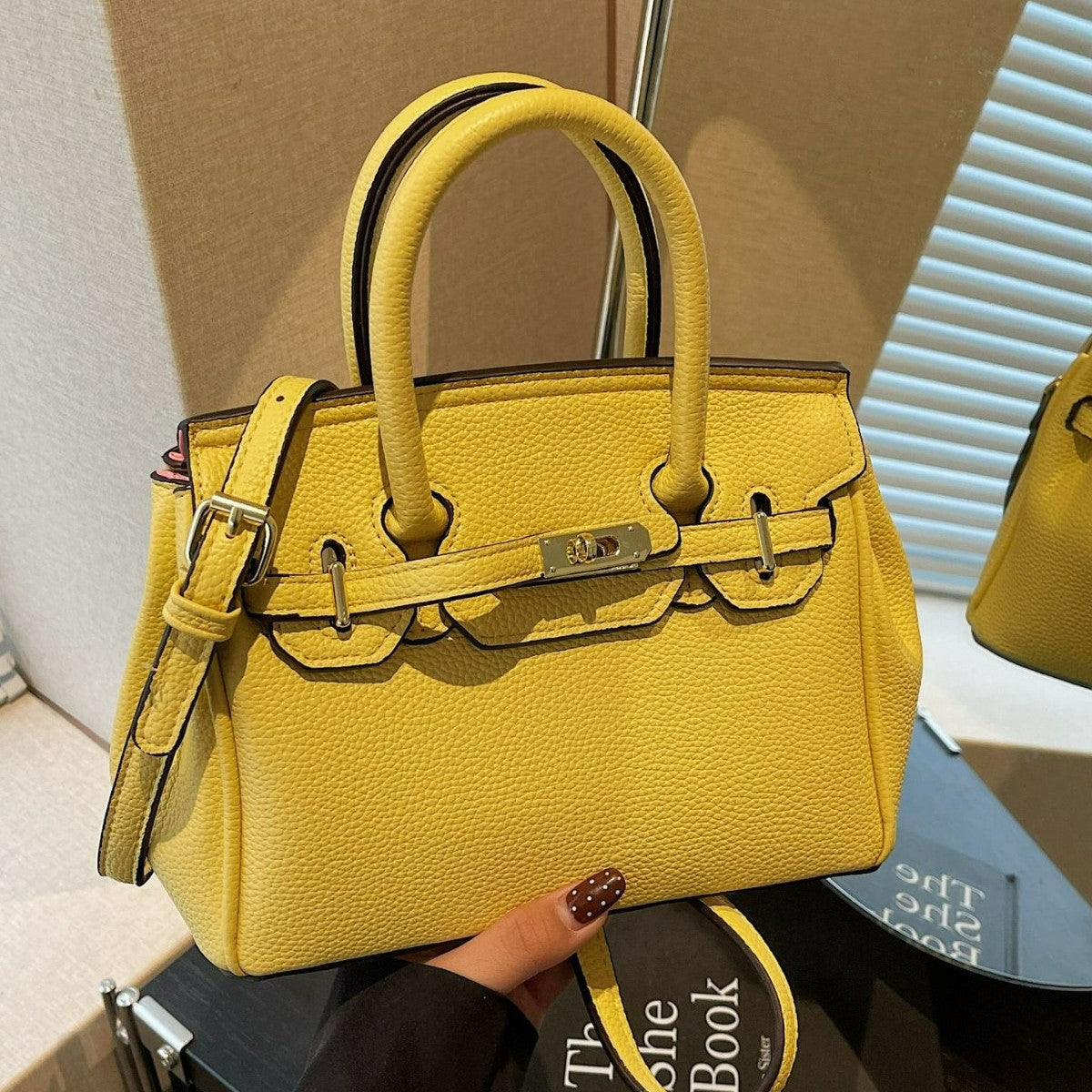 mini handbag with stylish detail
