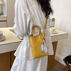 Mini Handbag with Elegant Pendant