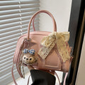 mini handbag with cute plush pendant and delicate bow decoration