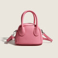 mini handbag with textured upper material and removable shoulder strap