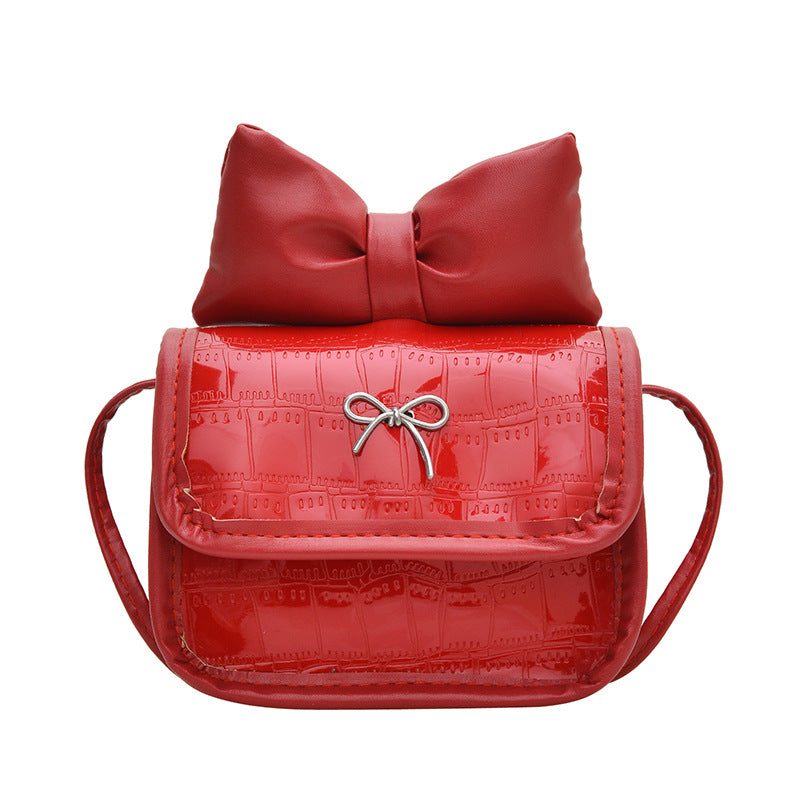 Women’s mini handbag with playful bow detail