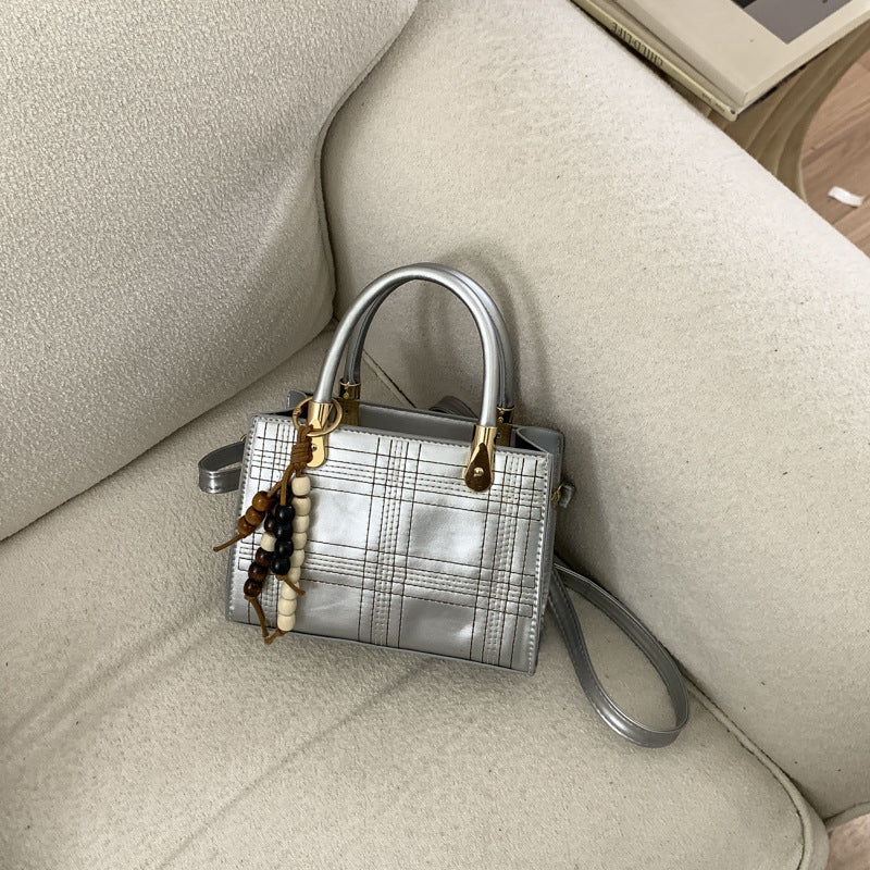 Mini Handbag with Elegant Structure and Golden Accents