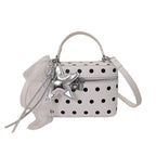 Women’s mini handbag with playful design and elegant accents