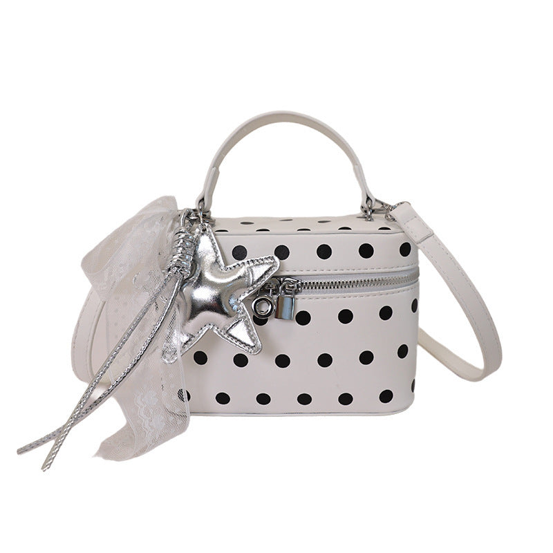 Women’s mini handbag with playful design and elegant accents