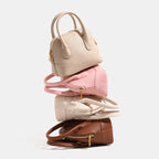 Ladies mini handbag with structured synthetic leather