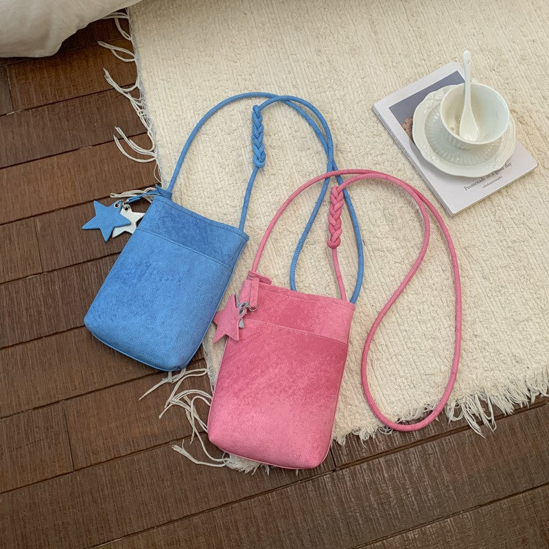 Fashionable shoulder bag with braided shoulder strap