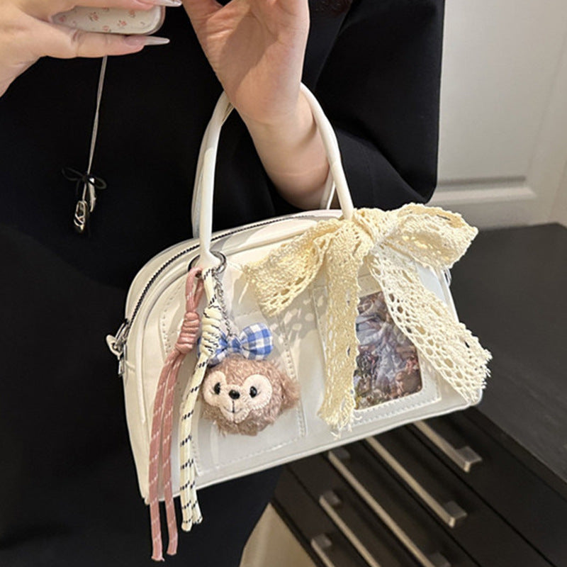 mini handbag with cute plush pendant and delicate bow decoration