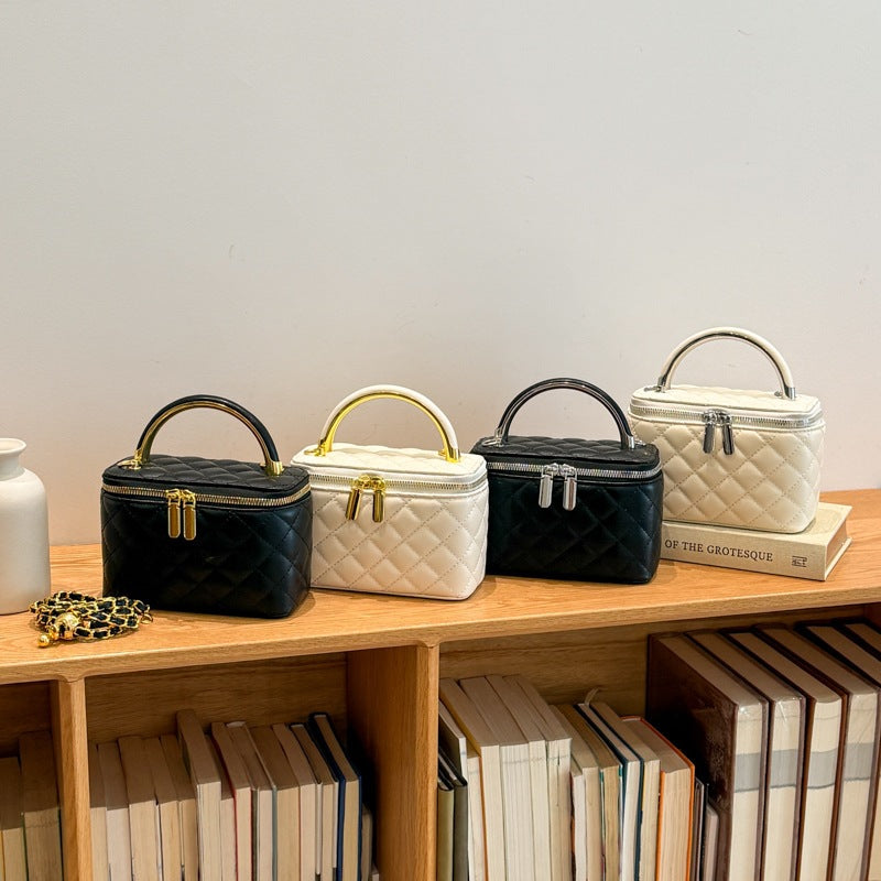 mini handbag with gold chain accent and textured design
