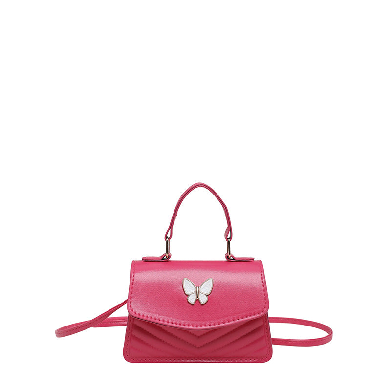 Chic Mini Handbag with Elegant Butterfly Accent