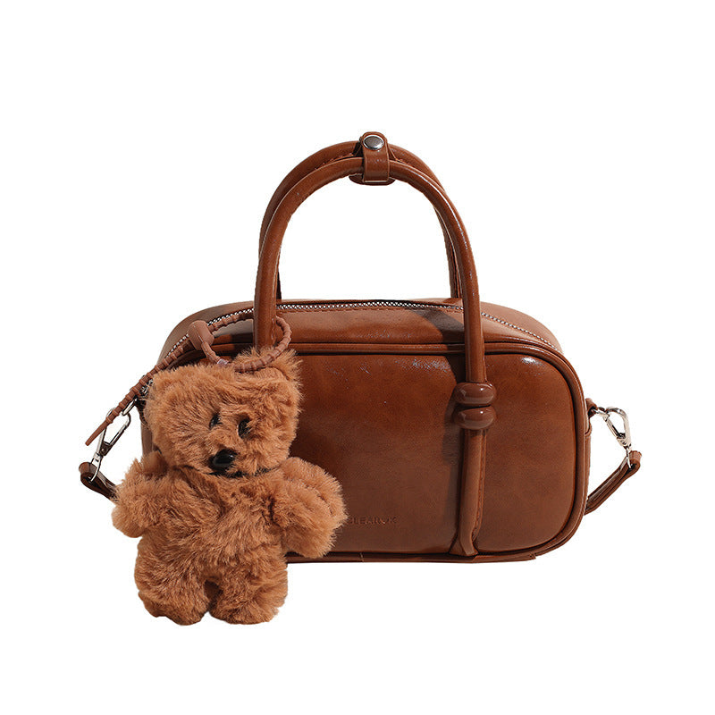 mini handbag with charming bear pendant