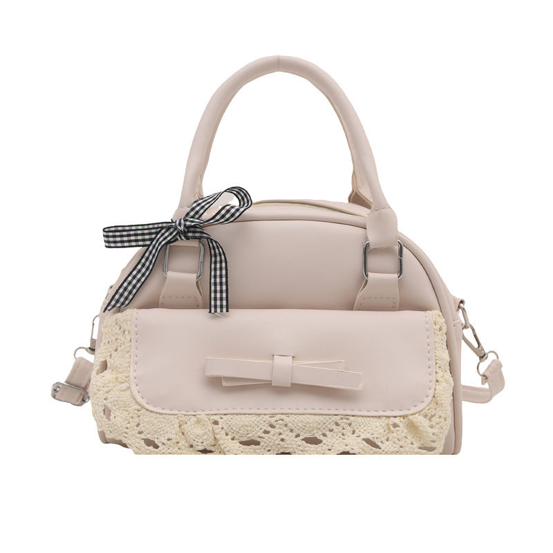 mini handbag with playful bow accent and floral details
