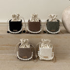 Women stylish mini handbag with drawstring and pearl accent Nord bags