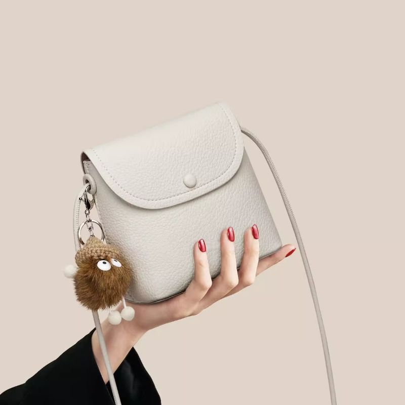 Compact Textured Crossbody Bag