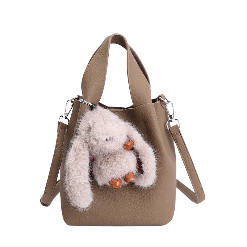 Women’s mini handbag with detachable plush pendant
