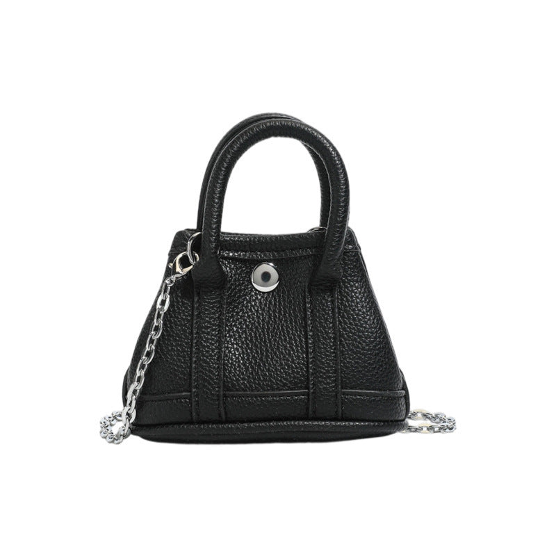 mini handbag with supple structure and detachable chain strap