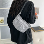 Fashionable shoulder bag with adjustable shoulder strap