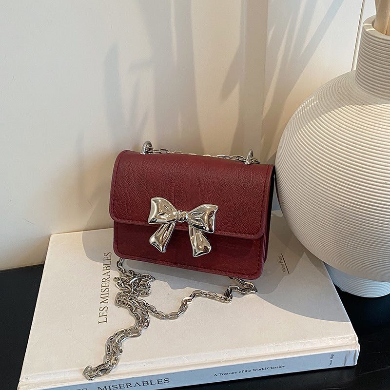 Charming Bow-Embellished Mini Handbag
