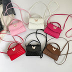 Chic Mini Handbag with Elegant Butterfly Accent