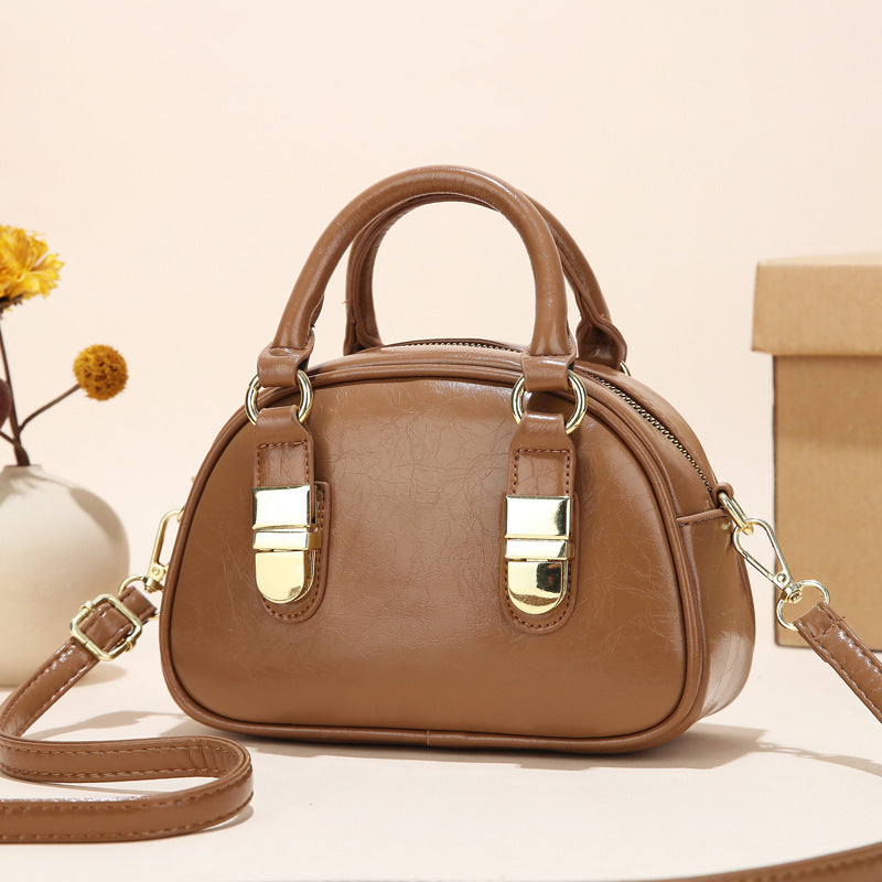 mini handbag with elegant design and detachable shoulder strap