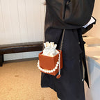 Ladies mini handbag with detachable pearl chain