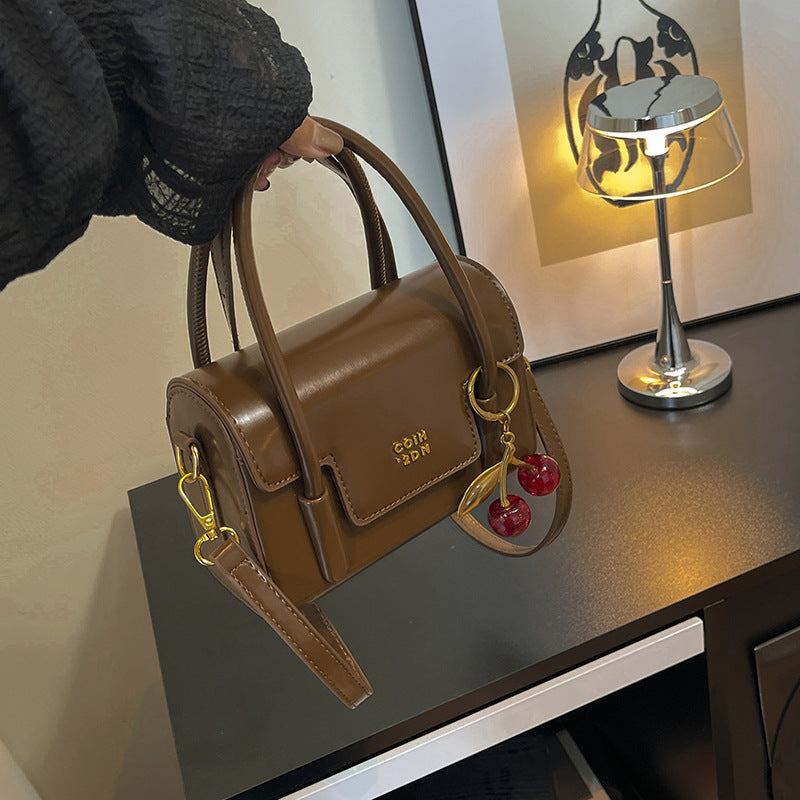 Ladies Mini-Handbag with Elegant Structure and Charming Pendant
