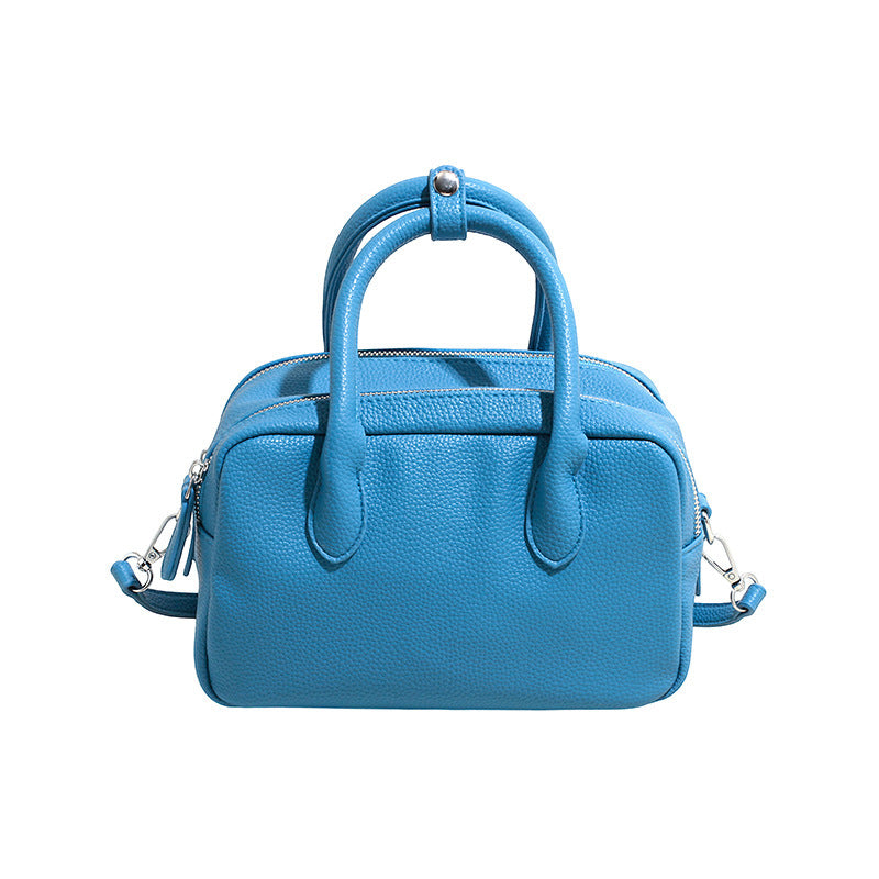 Women’s mini handbag with textured faux leather and elegant design