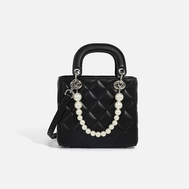 Women’s mini handbag with pearl-embellished chain and quilted design