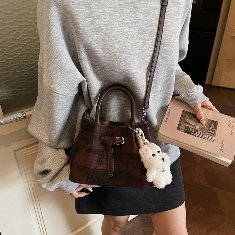 mini handbag with modern accents and practical interior organizer