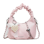 mini handbag with voluminous ruffle design and trendy pendants