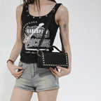 mini handbag with glittering upper material and golden studs