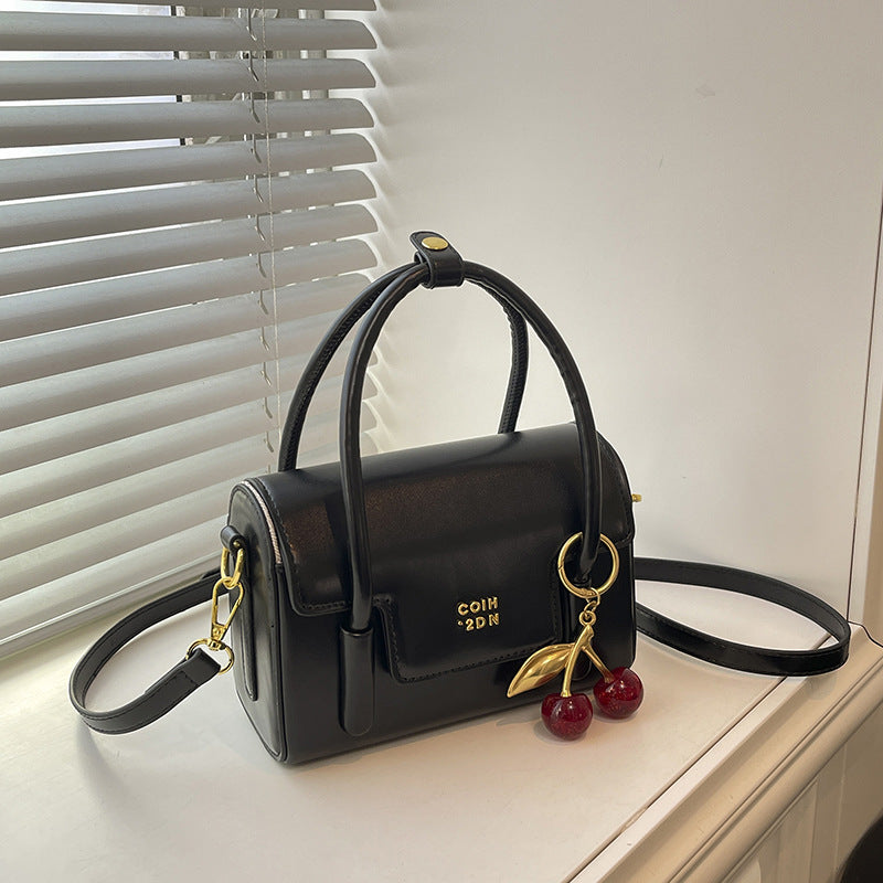Ladies Mini-Handbag with Elegant Structure and Charming Pendant