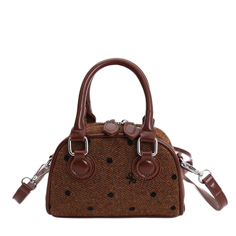 mini handbag made of high-quality material with a textured surface