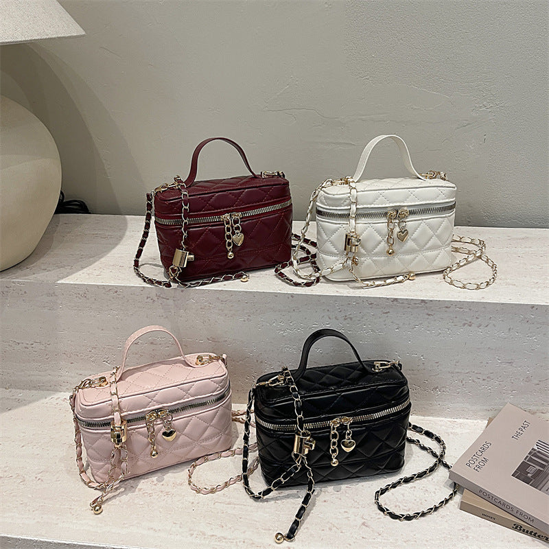 elegant quilted mini handbag with detachable shoulder strap