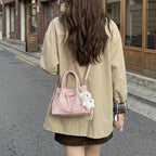 mini handbag with modern accents and practical interior organizer