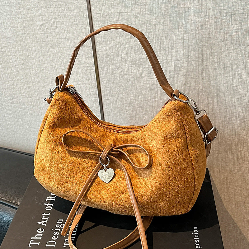 mini handbag with elegant bow design