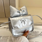 Women’s mini handbag with playful bow detail