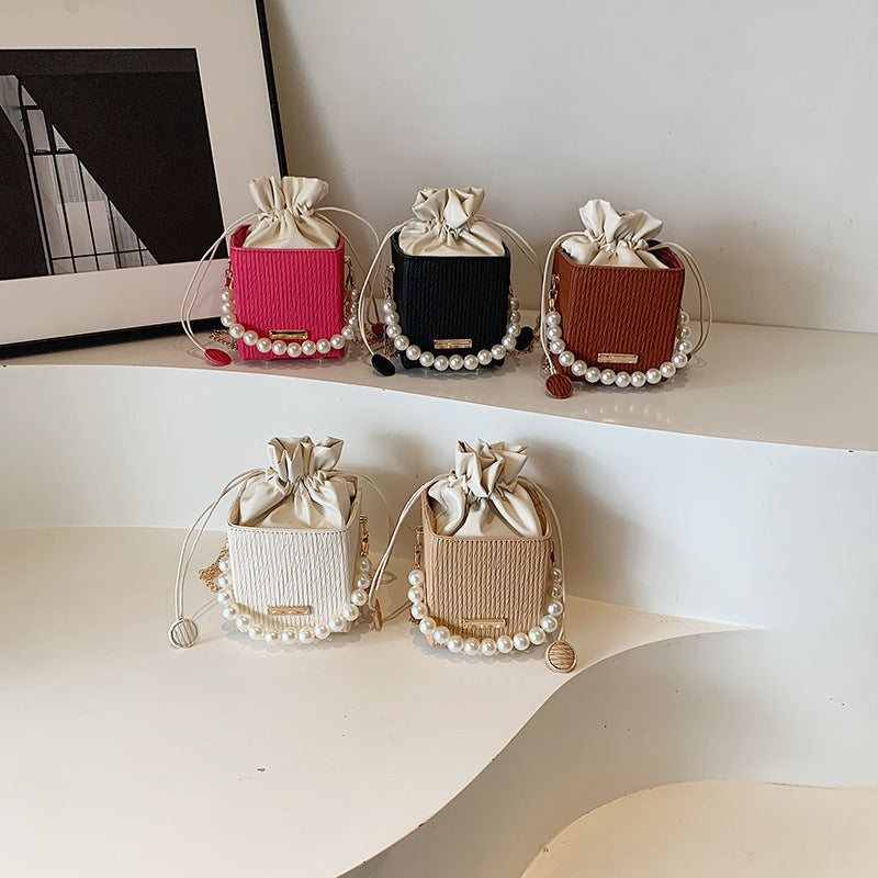 Ladies mini handbag with detachable pearl chain