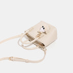 Mini Handbag with Playful Chain Charm