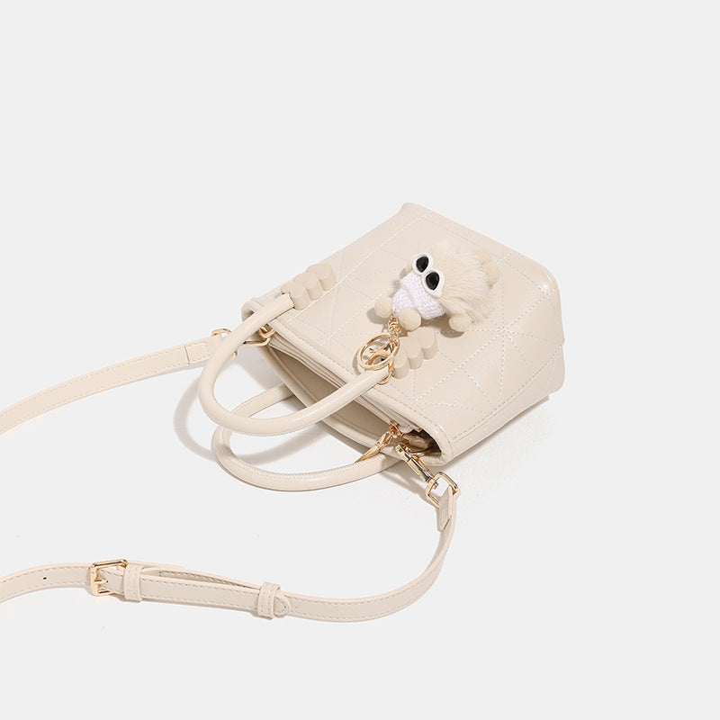 Mini Handbag with Playful Chain Charm