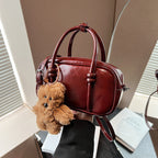 mini handbag with charming bear pendant