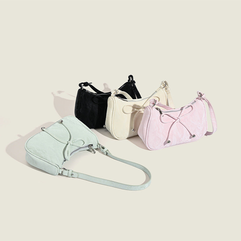 elegant mini handbag with playful drawstring Nord Bags