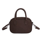 mini handbag with detachable shoulder strap and elegant design