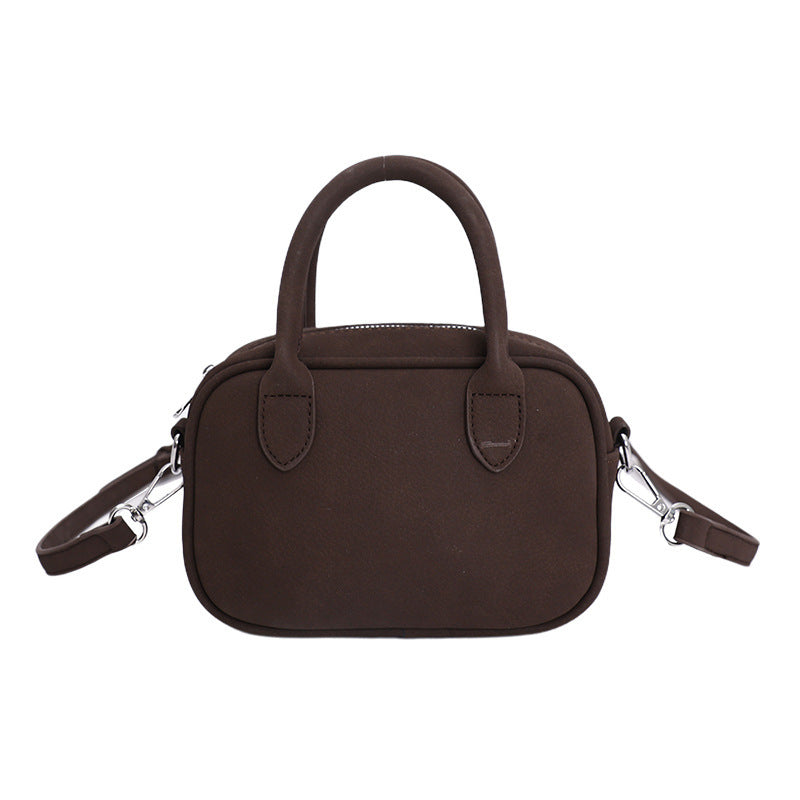 mini handbag with detachable shoulder strap and elegant design