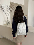 Backpack with velvet-soft upper material and elegant flap closure