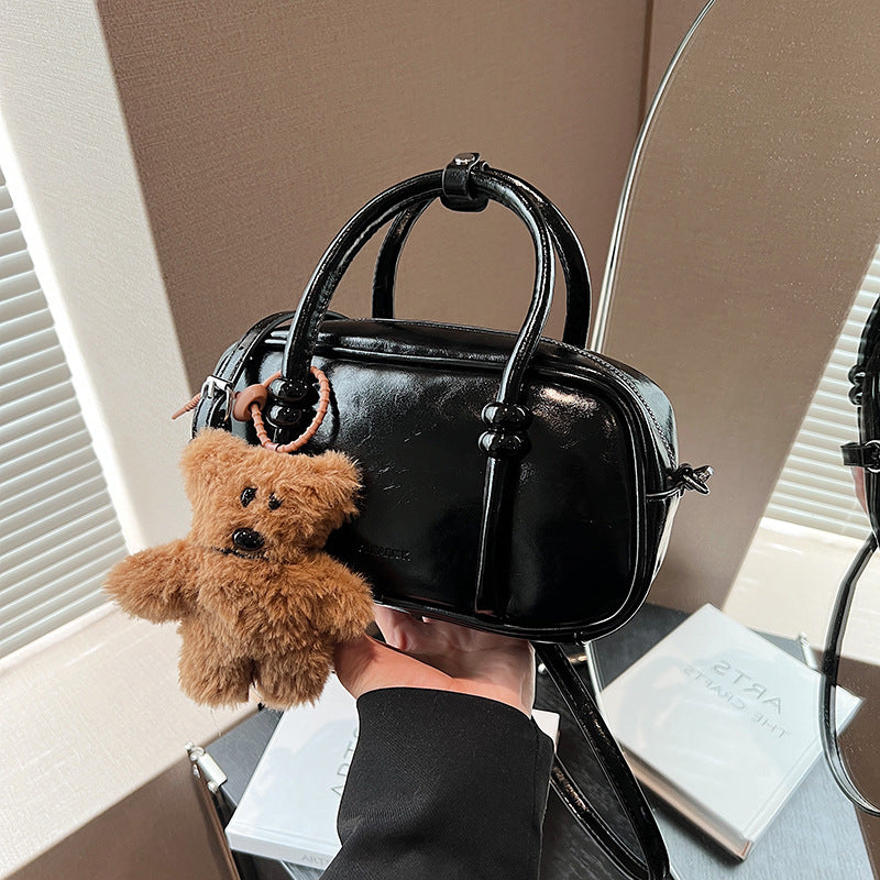 mini handbag with charming bear pendant