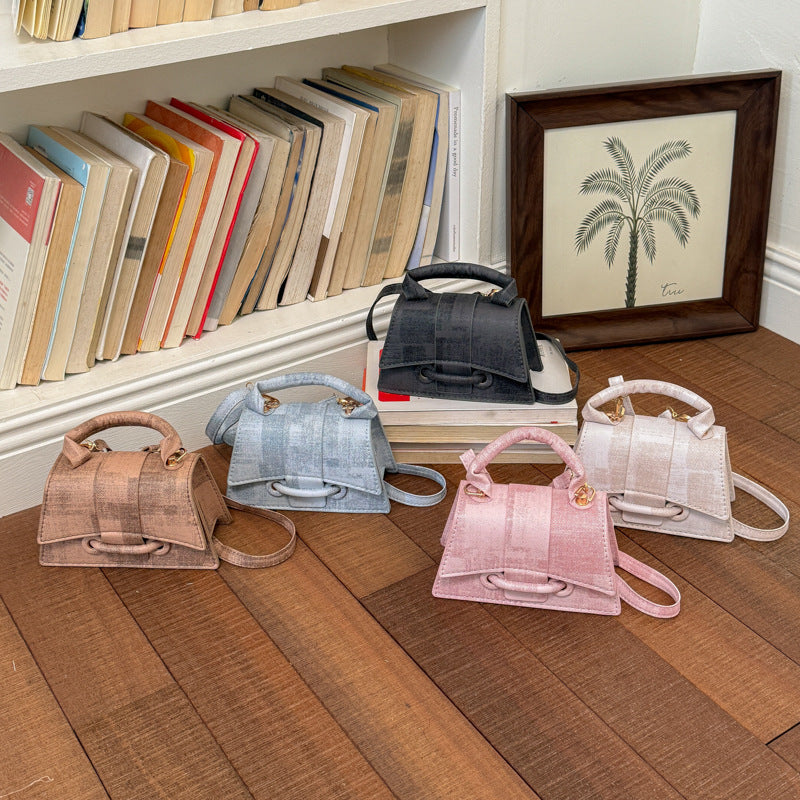Ladies elegant mini handbag with textured design