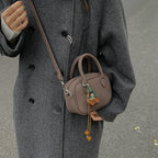 mini handbag with detachable shoulder strap and elegant design